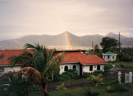 Rainbow over villa property in Statia